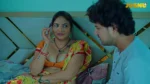 Scene from a Jugnu web series showing two people in conversation on a bed